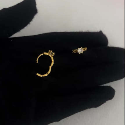 Romania gold sleeper earrings with gem