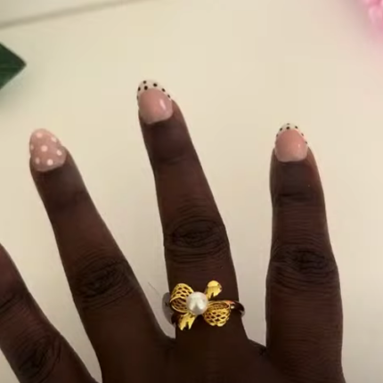 Gold plated bow tie ring with pearl